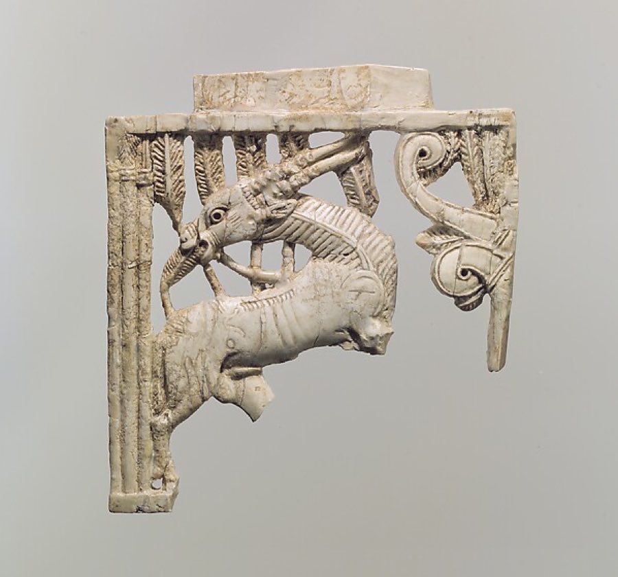 Assyrian — Openwork furniture plaque with a grazing oryx in a forest of fronds — Assyrian, ca. 9th–8th century BCE